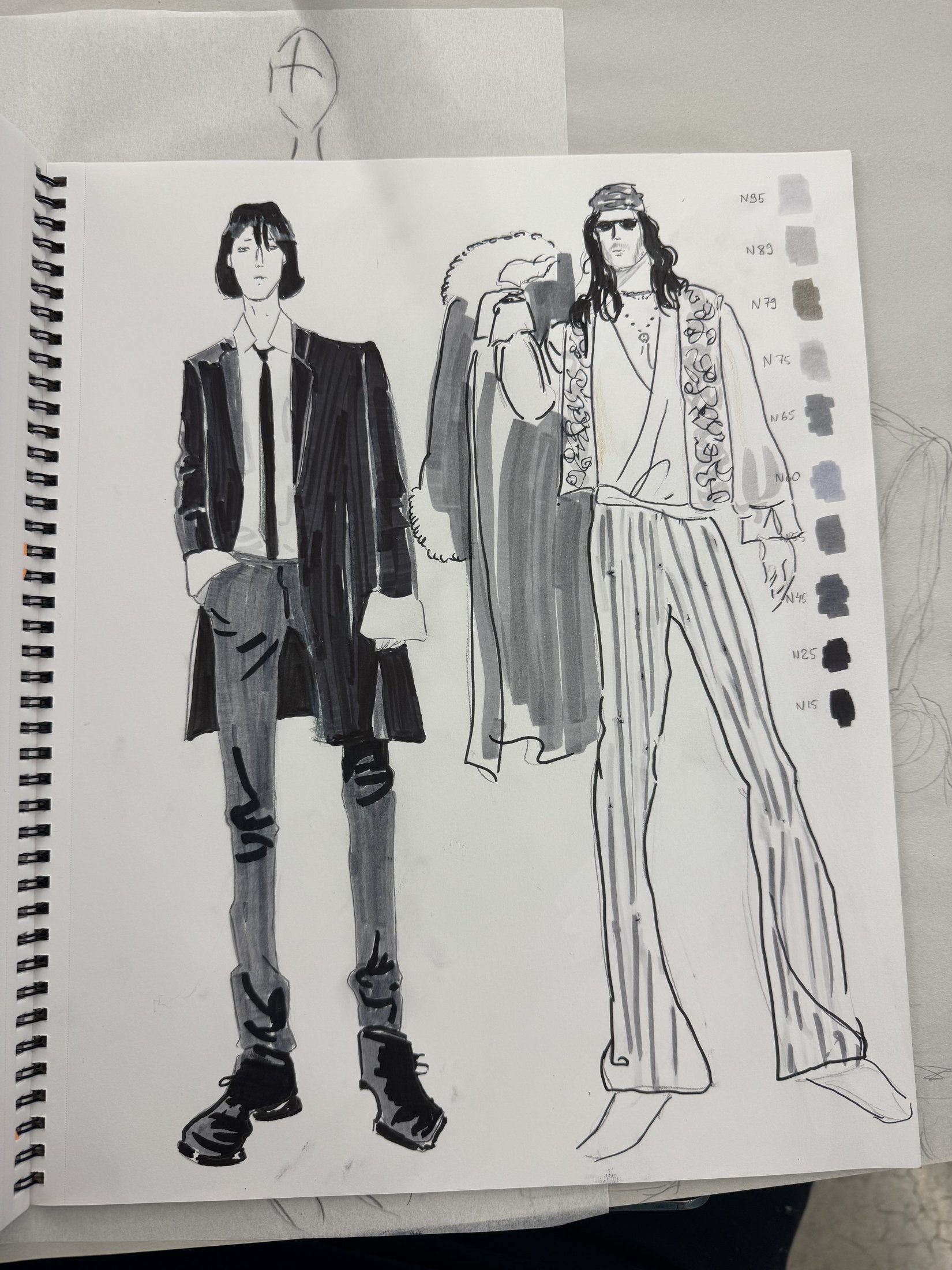 Black-and-white tailored fashion illustrations